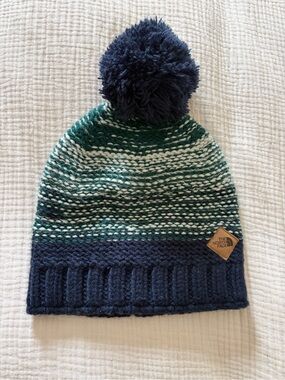 The North Face Pom Beanie in Navy & Green Striped Knit